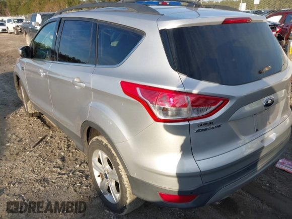 2014 Ford Escape SE with VIN 1FMCU9G96EUC53975, listed as a IAAI auction lot 41342661 with 128,594 mi miles. Bid and sale history available at carsss.com. Image 3.