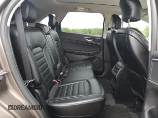 2019 Ford Edge SEL z VIN 2FMPK4J97KBB03622, wystawiony jako Copart lot #58164685 z przebiegiem 95 183 mil mil oraz Czysty tytuł • Clean title. Historia ofert i sprzedaży dostępna na DreamBid. Obrazek 11.