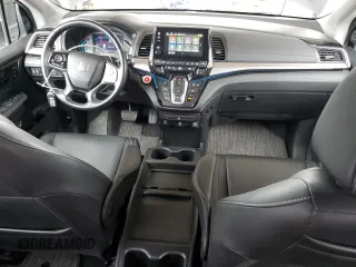 2022 Honda Odyssey Touring with VIN 5FNRL6H85NB023052, listed as a Copart auction lot 50884735 with 54,952 mi miles and Salvage Title. Bid and sale history available at DreamBid. Image 8.