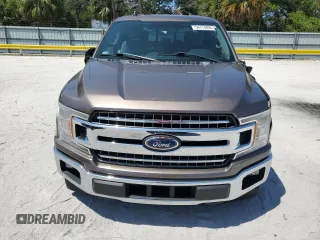 2018 Ford F-150 XL with VIN 1FTEW1CG4JKC38569, listed as a Copart auction lot 54779805 with 97,190 mi miles and Salvage Title. Bid and sale history available at carsss.com. Image 5.