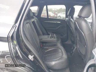 2017 BMW X1 sDrive28i with VIN WBXHU7C36HP924874, listed as a IAAI auction lot 41368396 with 113,443 mi miles. Bid and sale history available at carsss.com. Image 8.