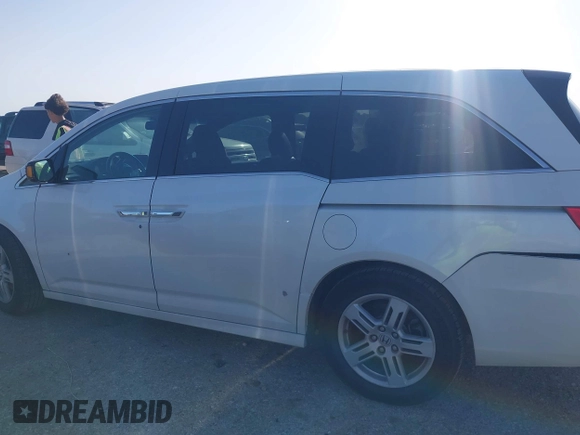 2012 Honda Odyssey Touring with VIN 5FNRL5H93CB125241, listed as a IAAI auction lot 42299053 with 125,549 mi miles and . Bid and sale history available at DreamBid. Image 14.