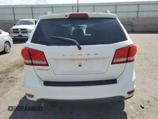 2012 Dodge Journey SXT z VIN 3C4PDCBG9CT135922, wystawiony jako Copart lot #54598615 z przebiegiem Nie podano mil oraz Szkoda całkowita • Salvage title. Historia ofert i sprzedaży dostępna na DreamBid. Obrazek 6.