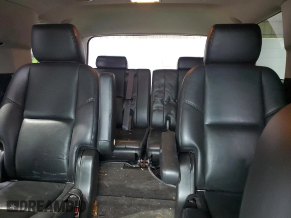 2011 GMC Yukon SLT with VIN 1GKS2CE06BR200400, listed as a Copart auction lot 50156125 with 203,008 mi miles and Salvage Title. Bid and sale history available at DreamBid. Image 10.