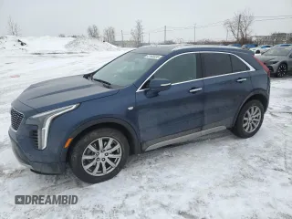 2022 Cadillac XT4 AWD Premium Luxury with VIN 1GYFZDR45NF153100, listed as a Copart auction lot 47483535 with 46,616 mi miles and Salvage Title. Bid and sale history available at carsss.com. Image 1.