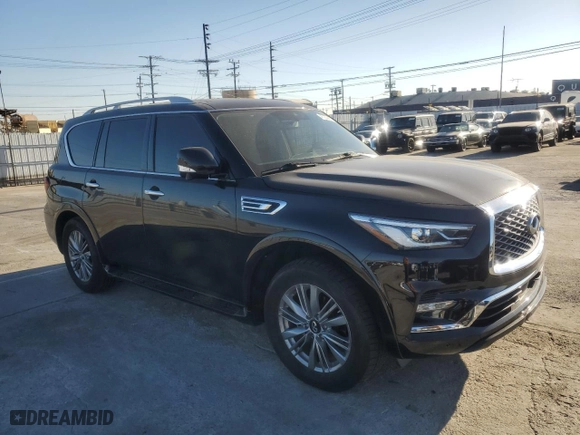 2021 Infiniti QX80 LUXE with VIN JN8AZ2AE7M9271353, listed as a Copart auction lot 47233415 with 76,521 mi miles and Salvage Title. Bid and sale history available at carsss.com. Image 4.