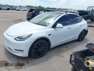 2021 Tesla Model Y Performance with VIN 5YJYGDEF9MF081798, listed as a IAAI auction lot 42033358 with 64,679 mi miles and . Bid and sale history available at DreamBid. Image 18.