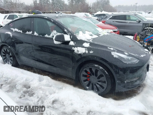 2023 Tesla Model Y Performance with VIN 7SAYGDEF4PF797192, listed as a IAAI auction lot 41550259 with 13,312 mi miles and . Bid and sale history available at DreamBid. Image 13.
