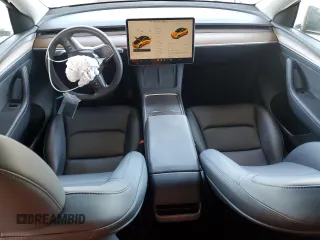 2024 Tesla Model Y Long Range с VIN 7SAYGDEE0RF981488, выставлен на аукционе Copart как лот 58704135 с пробегом 21 417 миль миль и Списание • Salvage title. История ставок и продаж доступна на DreamBid. Изображение 8.