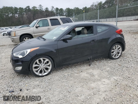 2012 Hyundai Veloster w/Red Int with VIN KMHTC6AD2CU058130, listed as a Copart auction lot 86747414 with 162,982 mi miles and Clean title. Bid and sale history available at DreamBid. Image 1.
