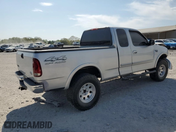 2000 Ford F-150 XL with VIN 1FTRX18L8YNB58706, listed as a Copart auction lot 53243215 with 0 mi miles and Salvage Title. Bid and sale history available at carsss.com. Image 3.