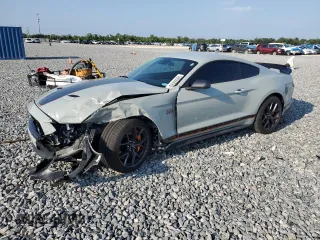 2023 Ford Mustang Mach 1 z VIN 1FA6P8R09P5501835, wystawiony jako Copart lot #58056095 z przebiegiem 24 977 mil mil oraz Szkoda całkowita • Salvage title. Historia ofert i sprzedaży dostępna na DreamBid. Obrazek 1.