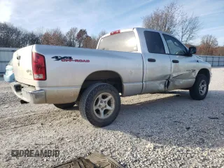 2003 Dodge 1500 with VIN 1D3HU18Z53J508034, listed as a Copart auction lot 84736694 with 198,526 mi miles and Salvage Title. Bid and sale history available at DreamBid. Image 3.