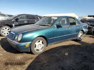 1997 Mercedes-Benz E-Class with VIN WDBJF72F7VA518538, listed as a Copart auction lot 83118824 with 167,288 mi miles and Salvage Title. Bid and sale history available at carsss.com. Image 1.