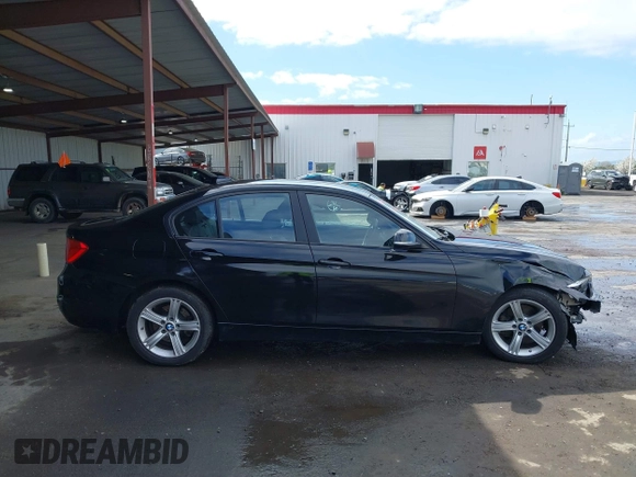 2015 BMW 3 Series 328i with VIN WBA3C1C53FK119723, listed as a IAAI auction lot 41871200 with 112,552 mi miles and . Bid and sale history available at carsss.com. Image 14.