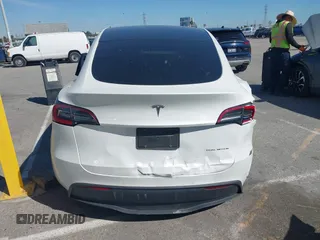 2020 Tesla Model Y Long Range with VIN 5YJYGDEE2LF044811, listed as a IAAI auction lot 41839136 with 68,445 mi miles and . Bid and sale history available at DreamBid. Image 16.