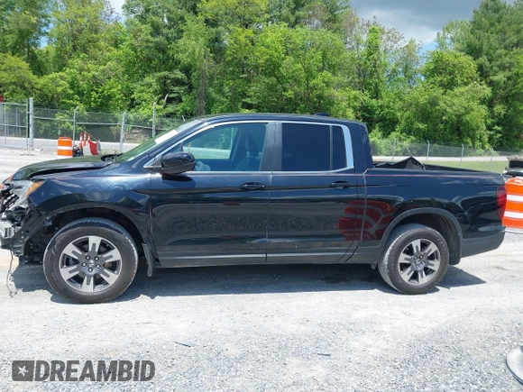 2017 Honda Ridgeline RTL with VIN 5FPYK3F51HB013989, listed as a IAAI auction lot 42206513 with 146,124 mi miles and . Bid and sale history available at DreamBid. Image 14.