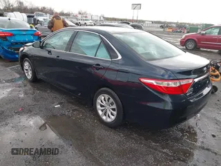 2015 Toyota Camry XLE with VIN 4T1BF1FK4FU043212, listed as a IAAI auction lot 41706573 with 170,074 mi miles and . Bid and sale history available at DreamBid. Image 3.