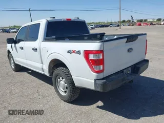 2022 Ford F-150 XL with VIN 1FTFW1E53NFA27670, listed as a IAAI auction lot 41976233 with 116,691 mi miles. Bid and sale history available at carsss.com. Image 3.