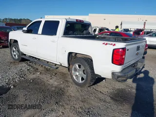 2017 Chevrolet Silverado 1500 LT with VIN 3GCUKREC8HG490827, listed as a IAAI auction lot 41810412 with 121,572 mi miles and . Bid and sale history available at DreamBid. Image 3.