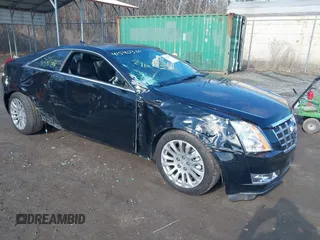 2014 Cadillac CTS Coupe Premium with VIN 1G6DH1E32E0177775, listed as a IAAI auction lot 41540366 with 106,398 mi miles. Bid and sale history available at carsss.com. Image 1.