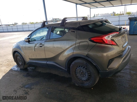 2021 Toyota C-HR LE with VIN NMTKHMBX0MR140098, listed as a Copart auction lot 82719504 with 43,869 mi miles and Clean Title. Bid and sale history available at carsss.com. Image 2.