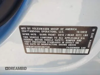 2013 Volkswagen Passat Wolfsburg Edition z VIN 1VWAP7A3XDC057745, wystawiony jako IAAI lot #42403087 z przebiegiem 40 312 mil mil oraz . Historia ofert i sprzedaży dostępna na DreamBid. Obrazek 9.
