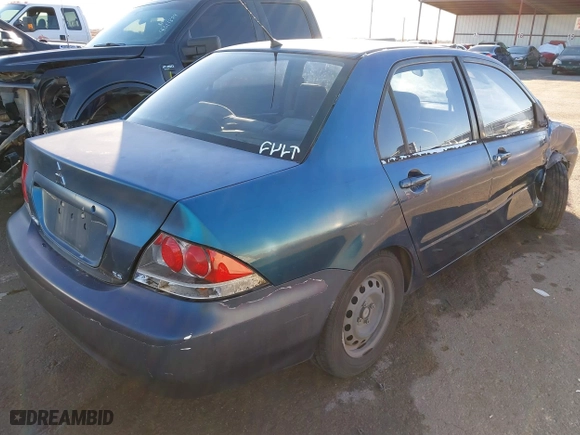 2005 Mitsubishi Lancer ES with VIN JA3AJ26E65U014838, listed as a IAAI auction lot 41310586 with 127,487 mi miles. Bid and sale history available at carsss.com. Image 4.