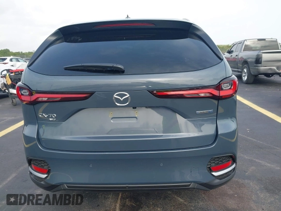 2025 Mazda CX-70 Premium Plus with VIN JM3KJEHA3S1126454, listed as a IAAI auction lot 42427454 with 5,648 mi miles and . Bid and sale history available at DreamBid. Image 16.