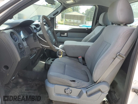2014 Ford F-150 XL with VIN 1FTMF1CM7EKD02336, listed as a Copart auction lot 57333815 with 126,053 mi miles and Salvage title. Bid and sale history available at DreamBid. Image 7.