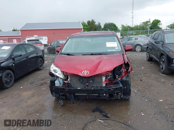 2015 Toyota Sienna XLE with VIN 5TDYK3DC9FS569714, listed as a IAAI auction lot 42297410 with 114,802 mi miles and . Bid and sale history available at DreamBid. Image 6.