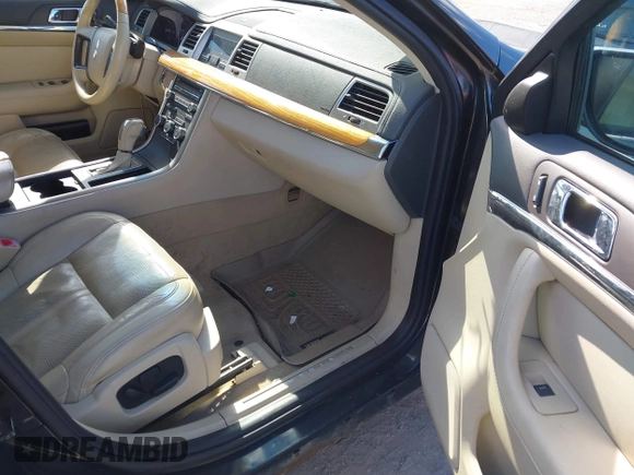2010 Lincoln MKS with VIN 1LNHL9ER9AG604947, listed as a IAAI auction lot 41552721 with 143,130 mi miles. Bid and sale history available at carsss.com. Image 5.