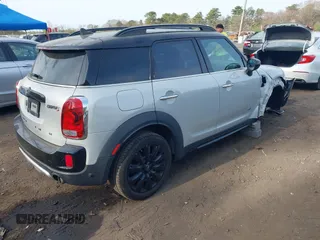 2020 MINI Countryman Cooper S z VIN WMZYX1C00L3L55740, wystawiony jako IAAI lot #42106897 z przebiegiem 92 609 mil mil oraz . Historia ofert i sprzedaży dostępna na DreamBid. Obrazek 4.