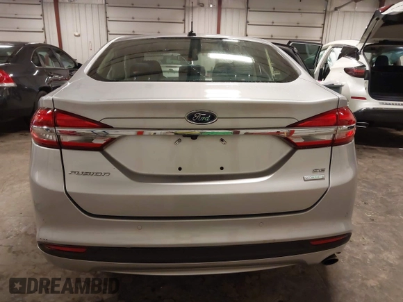 2018 Ford Fusion SE with VIN 3FA6P0HD1JR243112, listed as a IAAI auction lot 42256676 with 112,003 mi miles and . Bid and sale history available at DreamBid. Image 17.