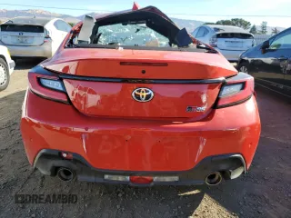 2024 Toyota GR86 with VIN JF1ZNBB15R8755014, listed as a Copart auction lot 76839334 with 2,560 mi miles and Salvage Title. Bid and sale history available at carsss.com. Image 6.