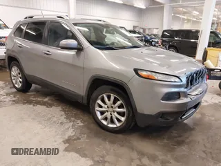 2014 Jeep Cherokee Limited z VIN 1C4PJMDS3EW275946, wystawiony jako IAAI lot #41444878 z przebiegiem 146 795 mil mil oraz . Historia ofert i sprzedaży dostępna na DreamBid. Obrazek 1.