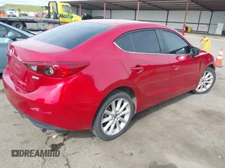 2017 Mazda 3 Touring with VIN 3MZBN1V79HM129043, listed as a IAAI auction lot 41970009 with 142,654 mi miles and . Bid and sale history available at DreamBid. Image 4.