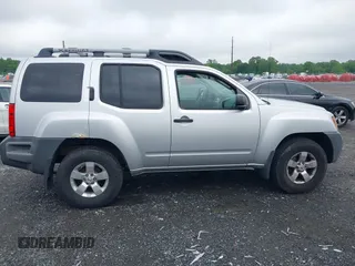 2010 Nissan Xterra S z VIN 5N1AN0NW5AC514800, wystawiony jako IAAI lot #42275230 z przebiegiem 78 900 mil mil oraz . Historia ofert i sprzedaży dostępna na DreamBid. Obrazek 13.