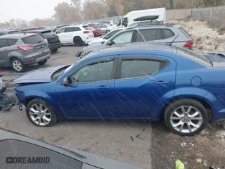 2013 Dodge Avenger R/T with VIN 1C3CDZBG6DN587236, listed as a IAAI auction lot 40826123 with 113,647 mi miles. Bid and sale history available at carsss.com. Image 15.