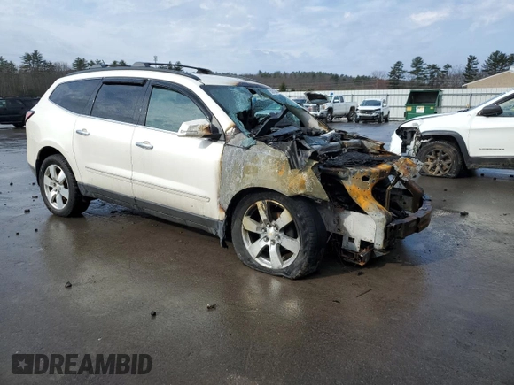 2014 Chevrolet Traverse LTZ z VIN 1GNKVJKD9EJ231164, wystawiony jako Copart lot #52876665 z przebiegiem Nie podano mil oraz Szkoda całkowita • Salvage title. Historia ofert i sprzedaży dostępna na DreamBid. Obrazek 4.