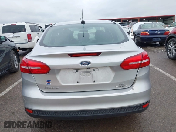 2015 Ford Focus SE with VIN 1FADP3F26FL254588, listed as a IAAI auction lot 42146381 with 99,280 mi miles and . Bid and sale history available at DreamBid. Image 16.