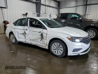 2019 Volkswagen Jetta S с VIN 3VWC57BU7KM013414, выставлен на аукционе Copart как лот 57952695 с пробегом 105 177 миль миль и Списание • Salvage title. История ставок и продаж доступна на DreamBid. Изображение 4.