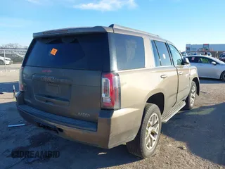 2015 GMC Yukon SLE with VIN 1GKS1AKCXFR712897, listed as a IAAI auction lot 41357889 with 1 mi miles. Bid and sale history available at carsss.com. Image 4.