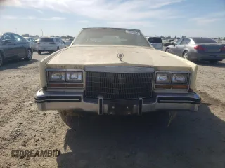 1982 Cadillac Eldorado z VIN 1G6AL578XCE608090, wystawiony jako Copart lot #73839654 z przebiegiem 22 185 mil mil oraz Czysty tytuł • Clean title. Historia ofert i sprzedaży dostępna na DreamBid. Obrazek 5.