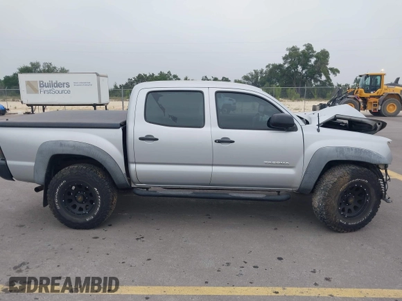 2006 Toyota Tacoma PreRunner z VIN 3TMJU62NX6M018693, wystawiony jako IAAI lot #42184797 z przebiegiem 193 953 mil mil oraz . Historia ofert i sprzedaży dostępna na DreamBid. Obrazek 14.