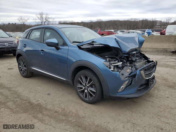 2018 Mazda CX-3 Grand Touring with VIN JM1DKFD72J0310660, listed as a Copart auction lot 48529505 with 65,108 mi miles and Salvage Title. Bid and sale history available at carsss.com. Image 4.