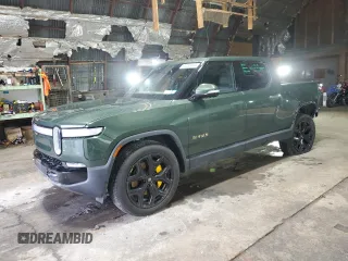 2023 Rivian R1T Adventure with VIN 7FCTGAAA0PN024165, listed as a Copart auction lot 84265444 with 0 mi miles and Salvage Title. Bid and sale history available at carsss.com. Image 1.