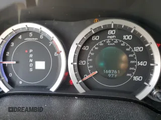 2012 Acura TSX Technology z VIN JH4CU2F6XCC000887, wystawiony jako Copart lot #56958195 z przebiegiem 168 761 mil mil oraz Szkody całkowita. Historia ofert i sprzedaży dostępna na DreamBid. Obrazek 9.