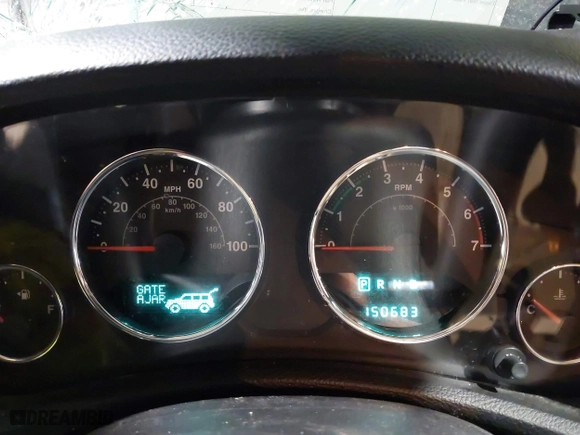 2011 Jeep Wrangler Unlimited Sahara with VIN 1J4HA5H12BL557059, listed as a IAAI auction lot 41856882 with 150,683 mi miles. Bid and sale history available at carsss.com. Image 7.