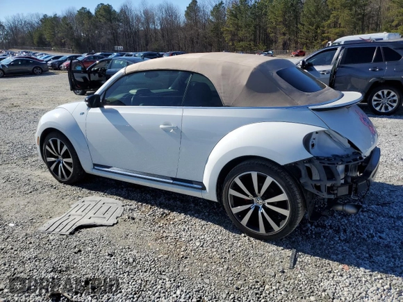 2015 Volkswagen Beetle with VIN 3VW7S7AT1FM818382, listed as a Copart auction lot 41666205 with 47,429 mi miles and Salvage Title. Bid and sale history available at DreamBid. Image 2.